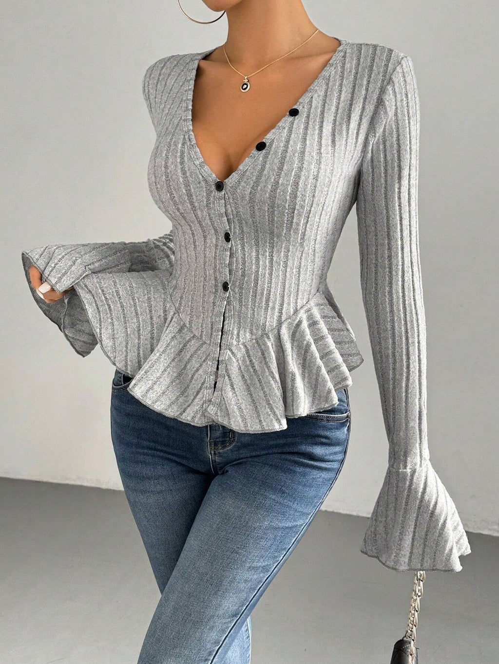 Léa Ruffled Peplum Knit Blouse