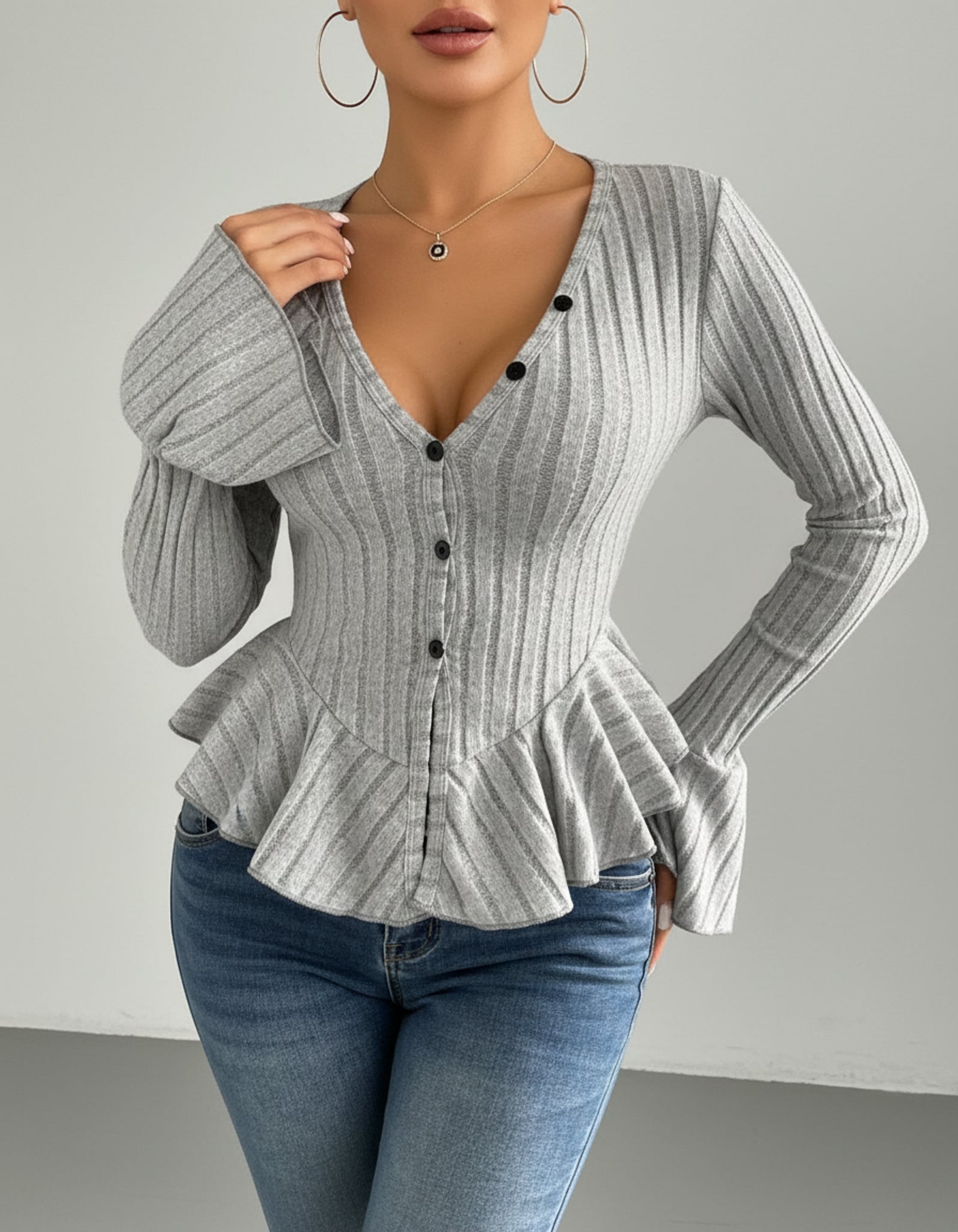 Léa Ruffled Peplum Knit Blouse